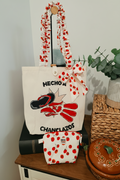 Tote Bag Pintada a Mano - Edición "Hecho a Chanclazos" (Set Premium con Cosmetiquera)